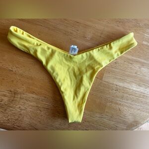 Andi Bagus 2 thong swim bottoms size S/M yellow and olive green